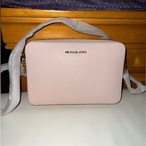 Michael Kors pink leather crossbody bag. Brand new